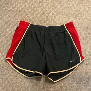 Nike Women's Black and Red Athletic Shorts with Gold Trim